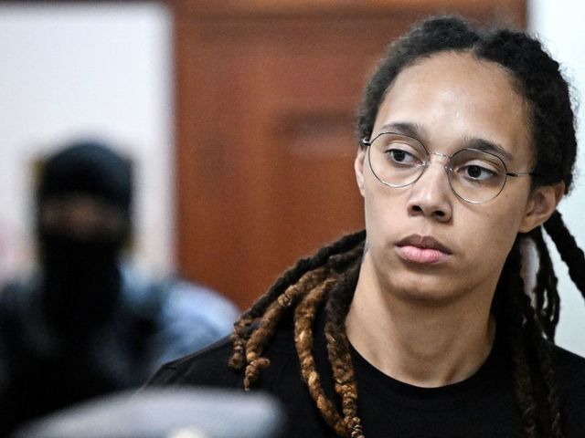 US WNBA basketball superstar Brittney Griner arrives to a hearing at the Khimki Court, outside Moscow on July 27, 2022. - Griner, a two-time Olympic gold medallist and WNBA champion, was detained at Moscow airport in February on charges of carrying in her luggage vape cartridges with cannabis oil, which could carry a 10-year prison sentence.