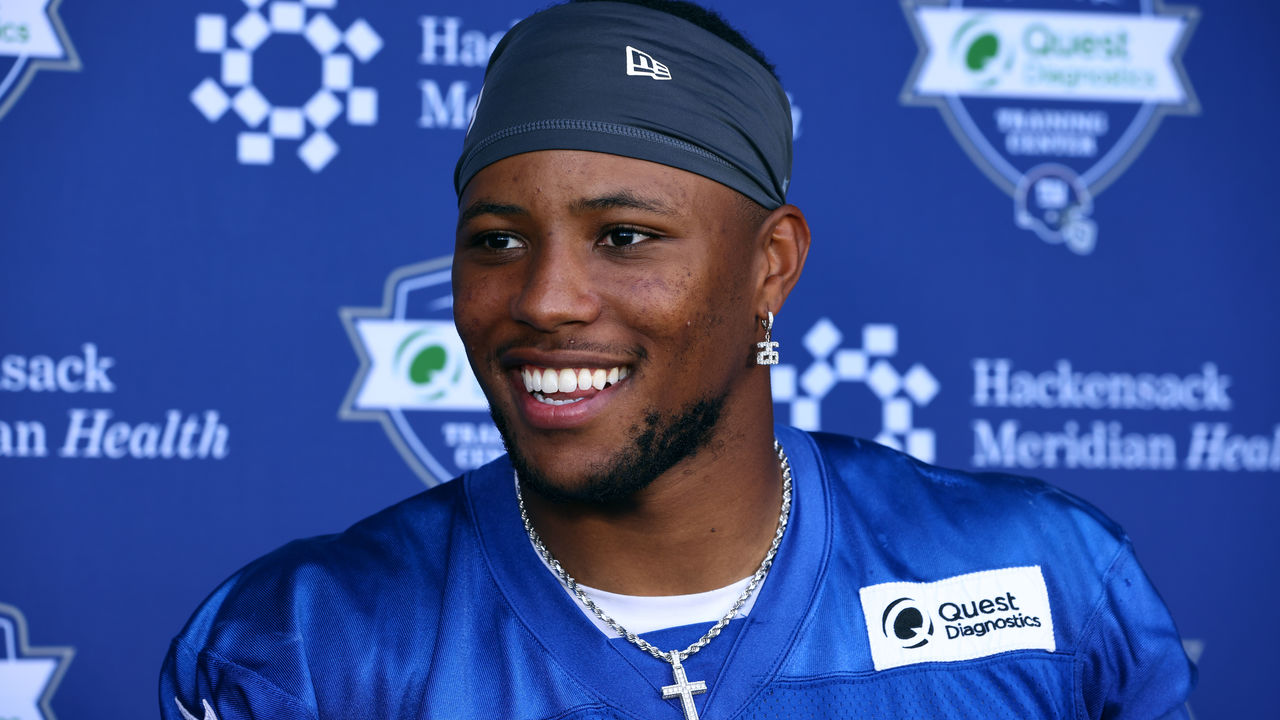 New York Giants running back Saquon Barkley (26) takes the field for an NFL  football game against the Philadelphia Eagles on Sunday, Dec. 11, 2022, in  East Rutherford, N.J. (AP Photo/Adam Hunger