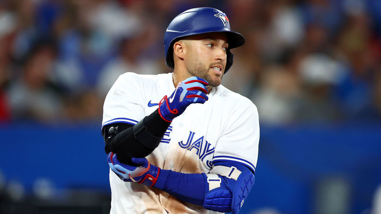 TORONTO, ON - JULY 28: George Springer #4 of the Toronto Blue Jays injures his elbow while flying out in the eighth inning against the Detroit Tigers at Rogers Centre on July 28, 2022 in Toronto, Ontario, Canada.