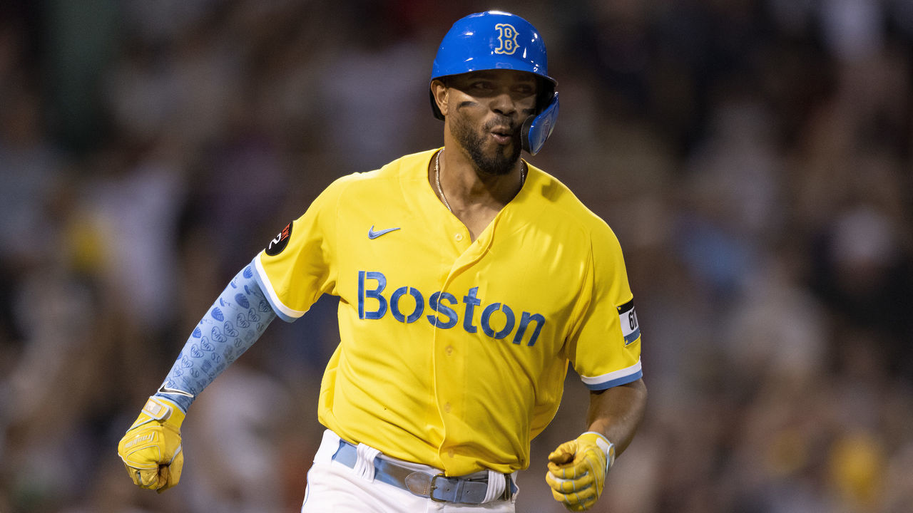 BOSTON, MA - JULY 28: Xander Bogaerts #2 of the Boston Red Sox reacts after hitting a go-ahead three run home run during the sixth inning of a game against the Cleveland Guardians on July 28, 2022 at Fenway Park in Boston, Massachusetts.