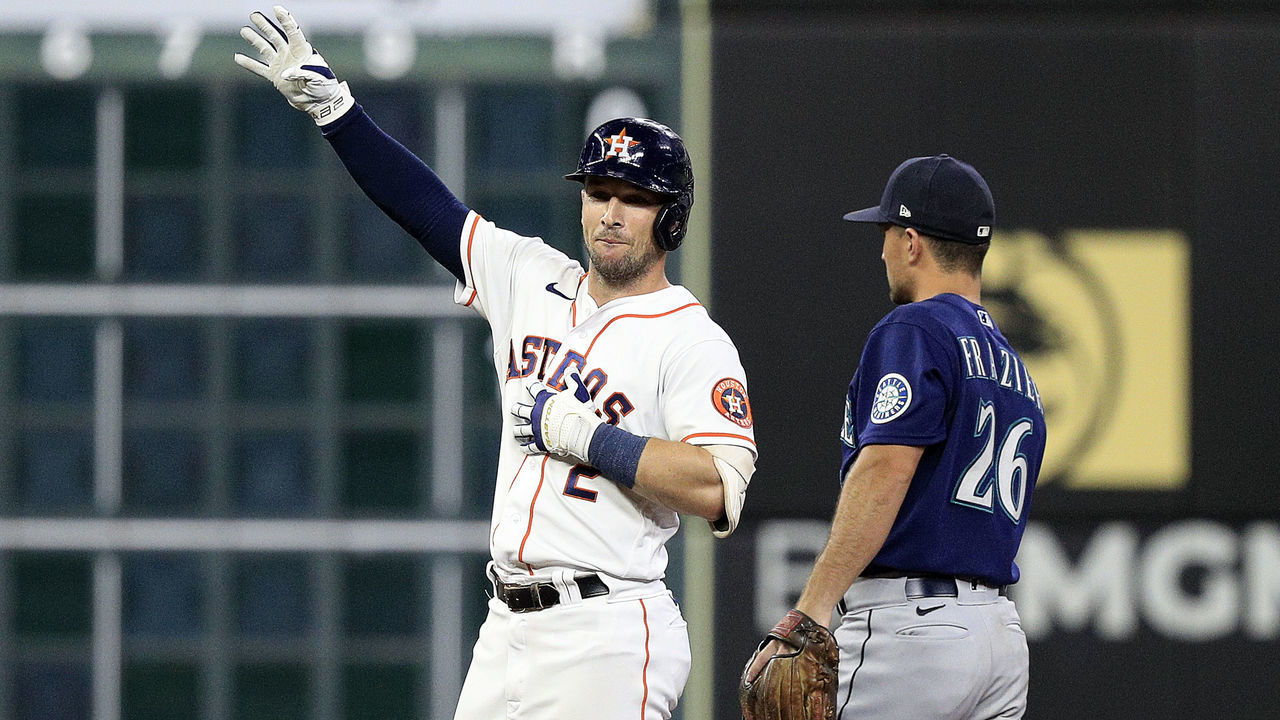 HOUSTON, TEXAS - JULY 28: Alex Bregman #2 of the Houston Astros doubles in a run in the eighth inning against the Seattle Mariners at Minute Maid Park on July 28, 2022 in Houston, Texas.