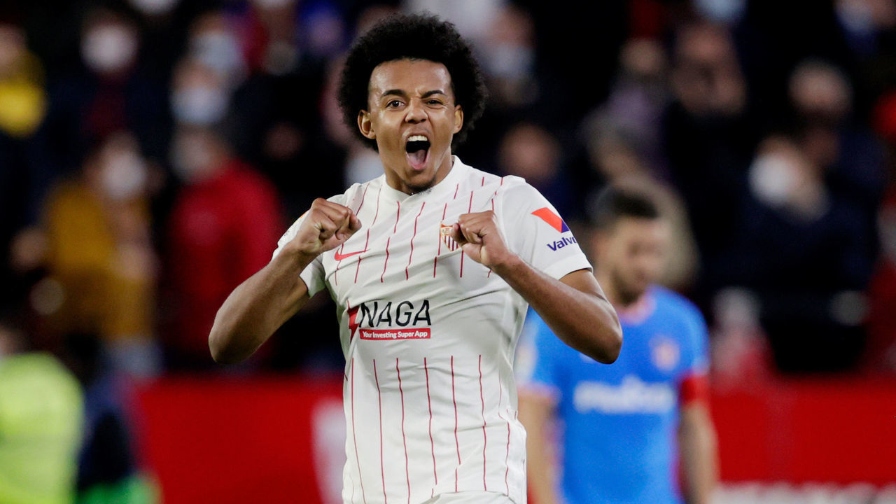 SEVILLA, SPAIN - DECEMBER 18: Jules Kounde of Sevilla FC celebrates during the La Liga Santander match between Sevilla v Atletico Madrid at the Estadio Ramon Sanchez Pizjuan on December 18, 2021 in Sevilla Spain