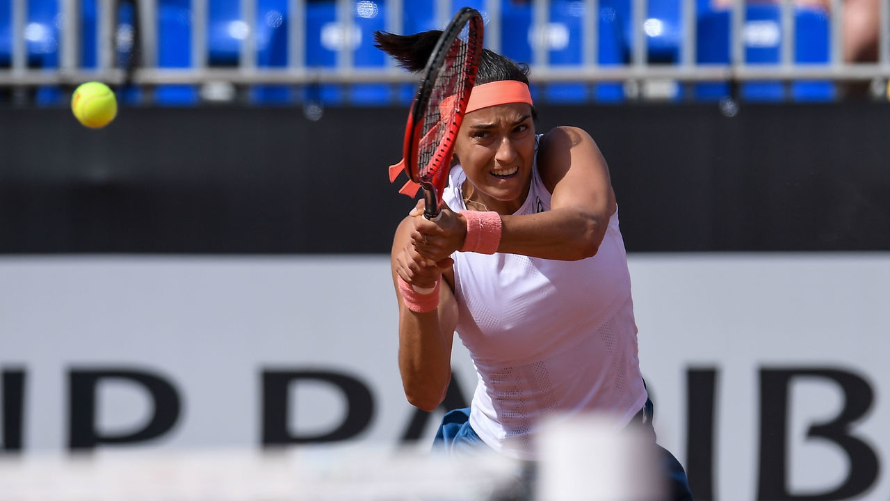 WARSAW, POLAND - JULY 28: Caroline Garcia of France plays against Elisabetta Cocciaretto of Italy during their second round match of the WTA250 BNP Paribas Poland Open on July 28, 2022 in Warsaw, Poland.