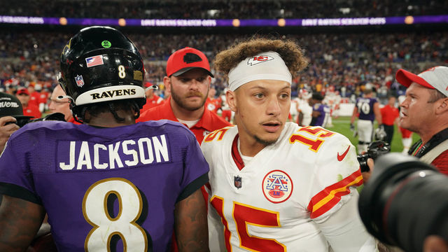 BALTIMORE, MARYLAND - SEPTEMBER 19: Lamar Jackson #8 of the Baltimore Ravens speaks with Patrick Mahomes #15 of the Kansas City Chiefs after an NFL game at M&T Bank Stadium on September 19, 2021 in Baltimore, Maryland.