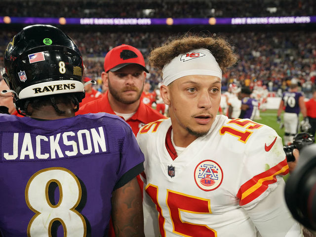 BALTIMORE, MARYLAND - SEPTEMBER 19: Lamar Jackson #8 of the Baltimore Ravens speaks with Patrick Mahomes #15 of the Kansas City Chiefs after an NFL game at M&T Bank Stadium on September 19, 2021 in Baltimore, Maryland.