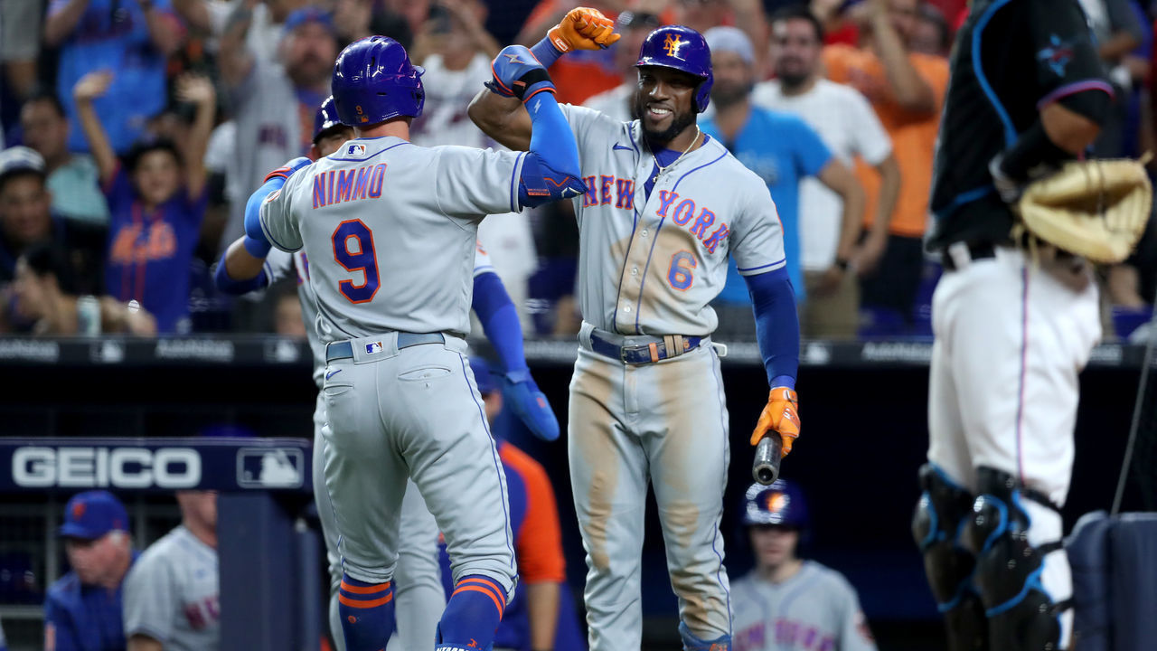 MIAMI, FLORIDA - JULY 29: Starling Marte #6 of the New York Mets celebrates with Brandon Nimmo #9 of the New York Mets after he hit a home run during the eighth inning against the Miami Marlins at loanDepot park on July 29, 2022 in Miami, Florida.