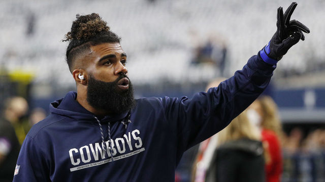 ARLINGTON, TEXAS - JANUARY 16: Ezekiel Elliott #21 of the Dallas Cowboys looks on during pregame warm-ups prior to a game against the San Francisco 49ers in the NFC Wild Card Playoff game at AT&T Stadium on January 16, 2022 in Arlington, Texas.