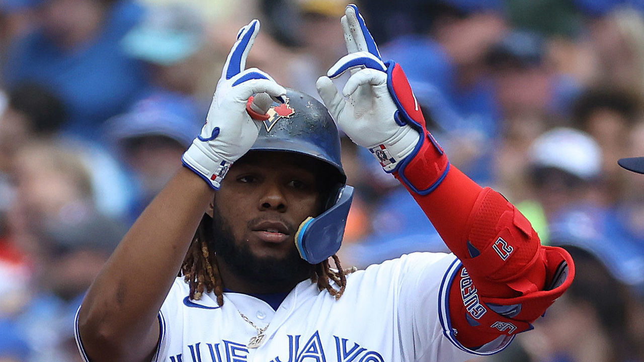 TORONTO, ON - JULY 30 - Toronto Blue Jays first baseman Vladimir Guerrero Jr. (27) hits a first inning single as the Toronto Blue Jays play the Detroit Tigers at Rogers Centre in Toronto. July 30, 2022. (Steve Russell/Toronto Star via Getty Images)