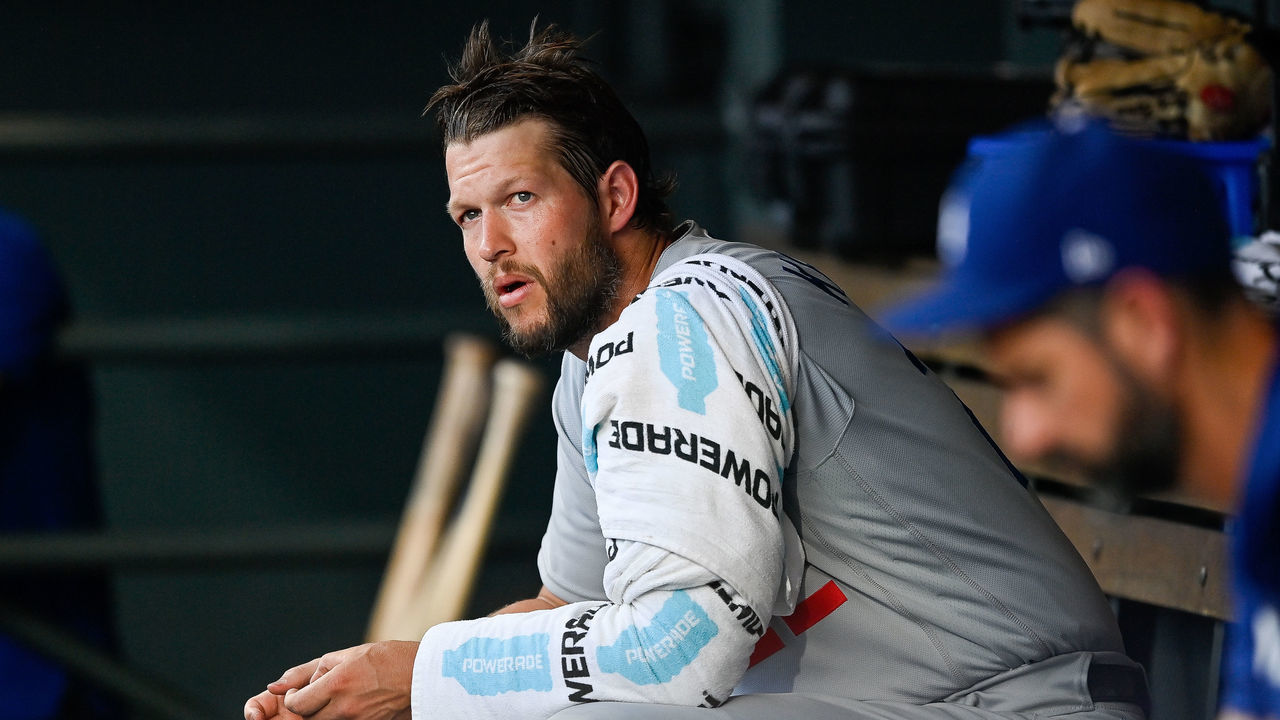 DENVER, CO - JULY 30: Los Angeles Dodgers starting pitcher Clayton Kershaw (22) looks on from the dugout during a game between the Los Angeles Dodgers and the Colorado Rockies at Coors Field on July 30, 2022 in Denver, Colorado.