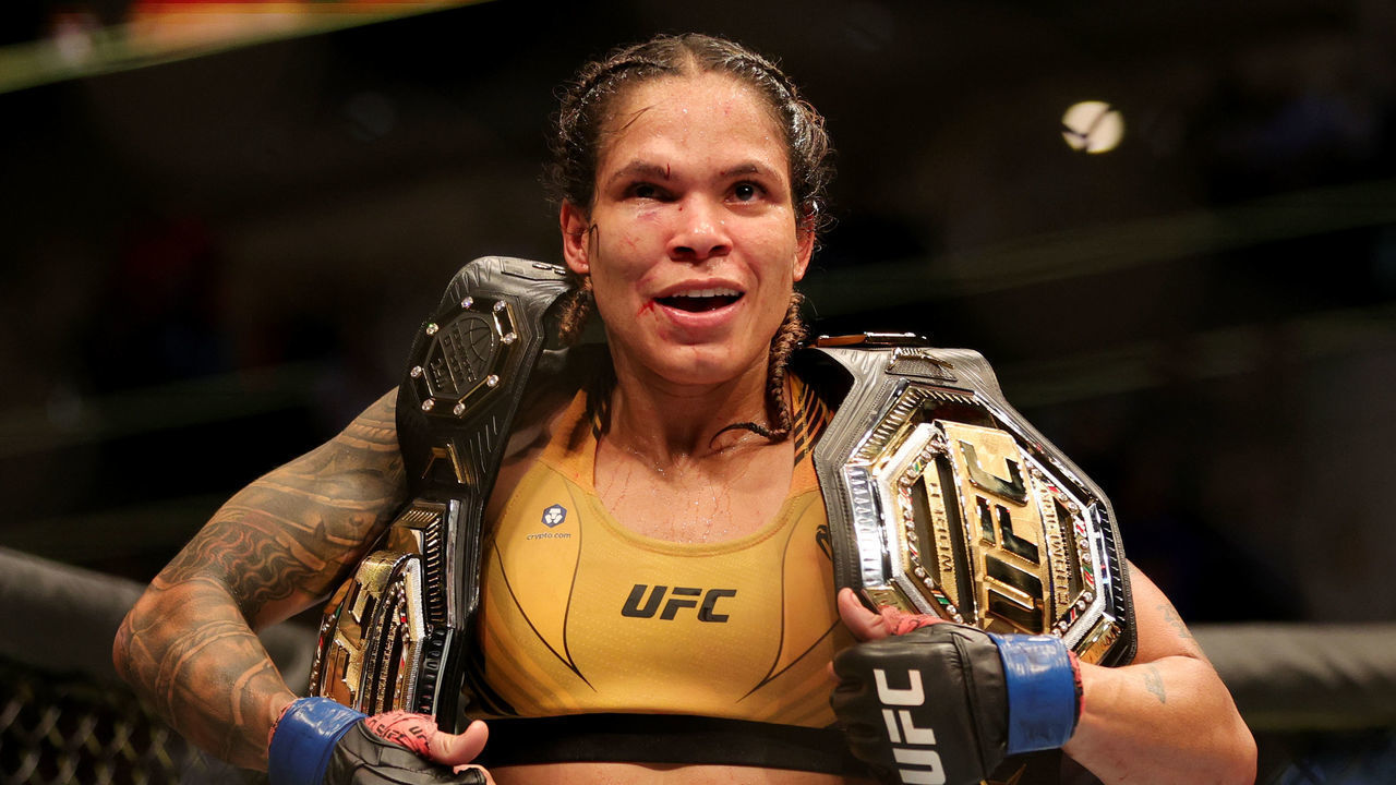DALLAS, TEXAS - JULY 30: Amanda Nunes of Brazil celebrates after defeating Julianna Pena in their bantamweight title bout during UFC 277 at American Airlines Center on July 30, 2022 in Dallas, Texas. Amanda Nunes won via unanimous decision.