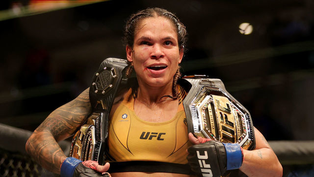 DALLAS, TEXAS - JULY 30: Amanda Nunes of Brazil celebrates after defeating Julianna Pena in their bantamweight title bout during UFC 277 at American Airlines Center on July 30, 2022 in Dallas, Texas. Amanda Nunes won via unanimous decision.