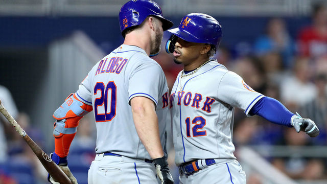 MIAMI, FLORIDA - JULY 30: Francisco Lindor #12 of the New York Mets celebrates his home run with Pete Alonso #20 of the New York Mets during the eighth inning against the Miami Marlins at loanDepot park on July 30, 2022 in Miami, Florida.
