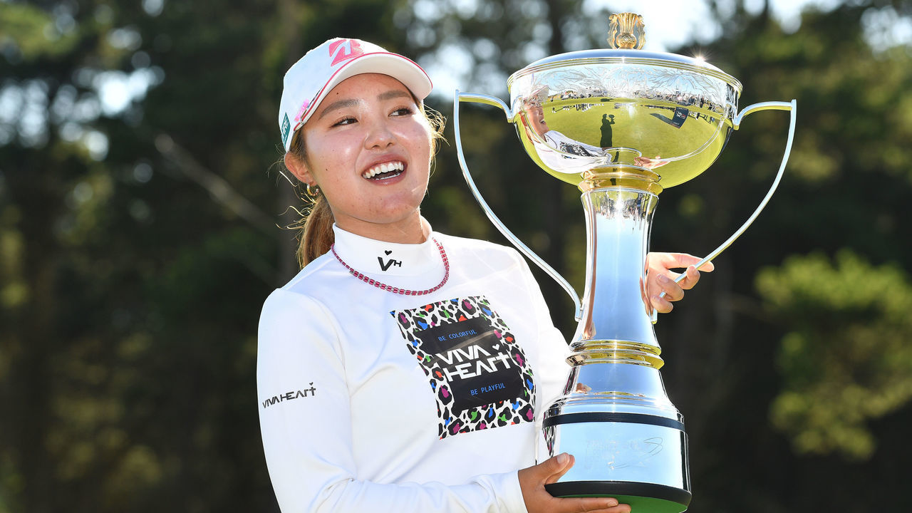 TROON, SCOTLAND - JULY 31: Ayaka Furue of Japan poses at the 18th green with the trophy as she wins the Trust Golf Women's Scottish Open at Dundonald Links Golf Course on July 31, 2022 in Troon, Scotland.