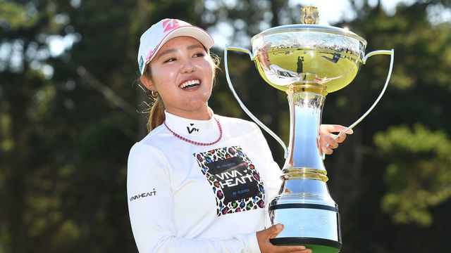 TROON, SCOTLAND - JULY 31: Ayaka Furue of Japan poses at the 18th green with the trophy as she wins the Trust Golf Women's Scottish Open at Dundonald Links Golf Course on July 31, 2022 in Troon, Scotland.
