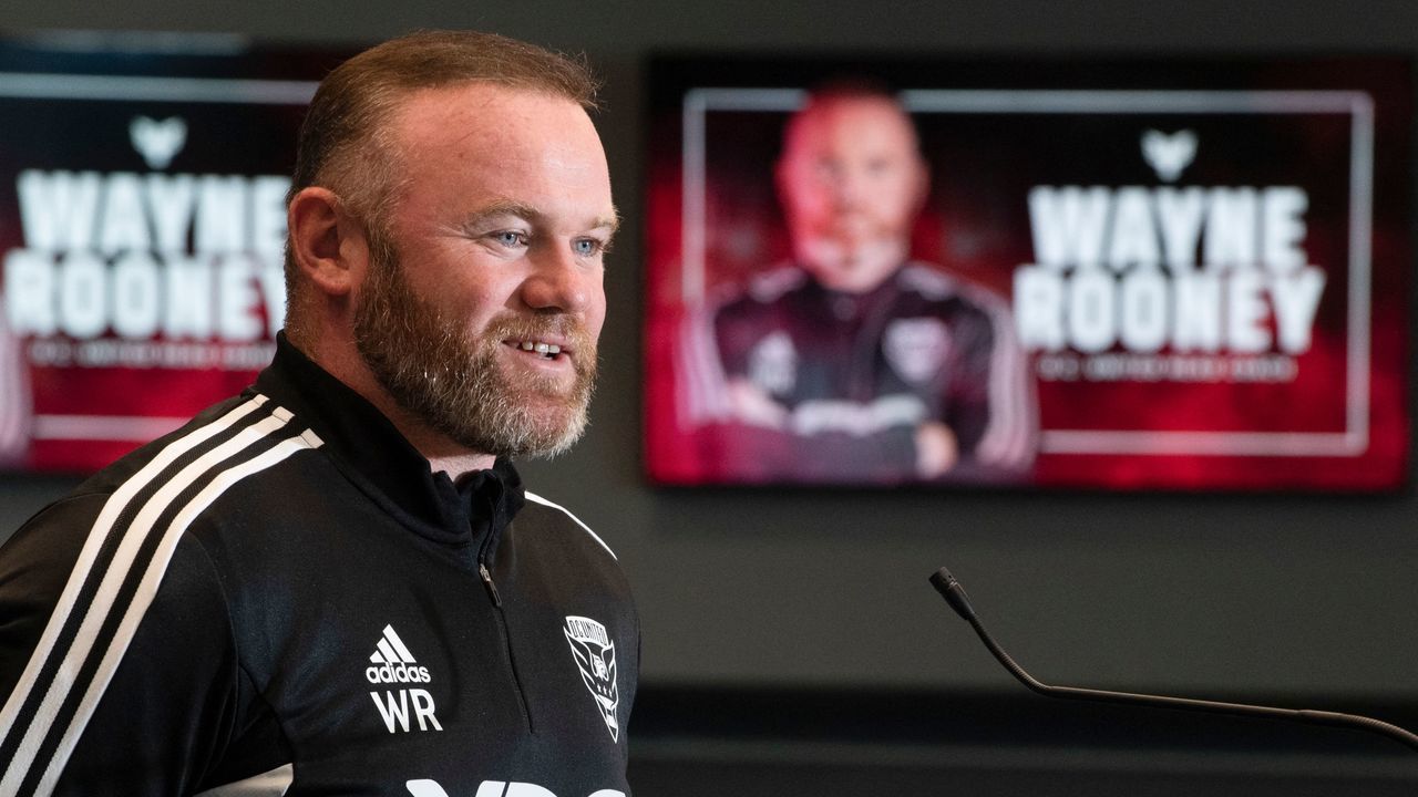 British soccer star Wayne Rooney speaks during a press conference where he was announced as the new Head Coach of Major League Soccer's DC United at Audi Field in Washington, DC, on July 12, 2022. - Former England and Manchester United star Wayne Rooney was named on Tuesday as the new head coach of DC United and tasked with reviving the moribund Major League Soccer team.