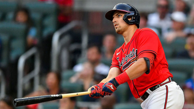 ATLANTA, GA JULY 29: Atlanta third baseman Austin Riley (27) hits a double during the MLB game between the Arizona Diamondbacks and the Atlanta Braves on July 29th, 2022 at Truist Park in Atlanta, GA.