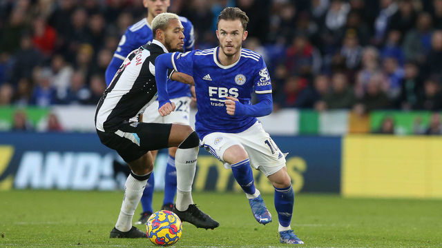 LEICESTER, ENGLAND - DECEMBER 12: Leicester City's James Maddison runs past Newcastle United's Joelinton during the Premier League match between Leicester City and Newcastle United at The King Power Stadium on December 12, 2021 in Leicester, England.