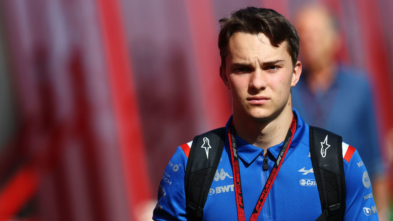 BARCELONA, SPAIN - MAY 20: Oscar Piastri of Australia, Alpine F1 Reserve Driver walks in the Paddock prior to practice ahead of the F1 Grand Prix of Spain at Circuit de Barcelona-Catalunya on May 20, 2022 in Barcelona, Spain.