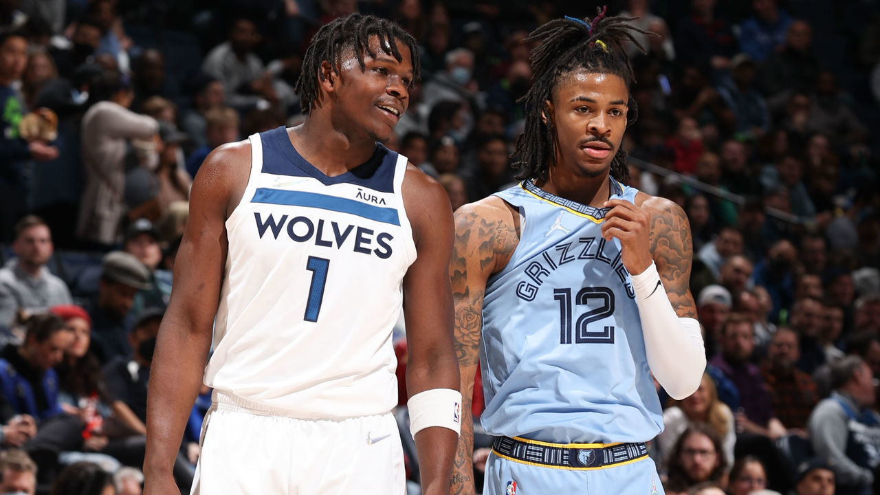 MINNEAPOLIS, MN - FEBRUARY 24: Anthony Edwards #1 of the Minnesota Timberwolves talks to Ja Morant #12 of the Memphis Grizzlies during the game on February 24, 2022 at Target Center in Minneapolis, Minnesota. Mandatory Copyright Notice: Copyright 2022 NBAE