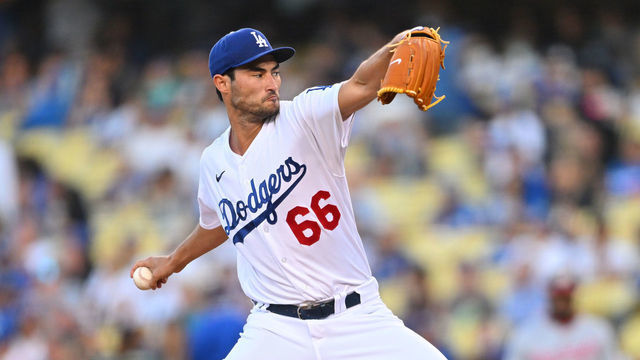 LOS ANGELES, CA - JULY 26: Mitch White #66 of the Los Angeles Dodgers pitches in the first inning against the Washington Nationals at Dodger Stadium on July 26, 2022 in Los Angeles, California.