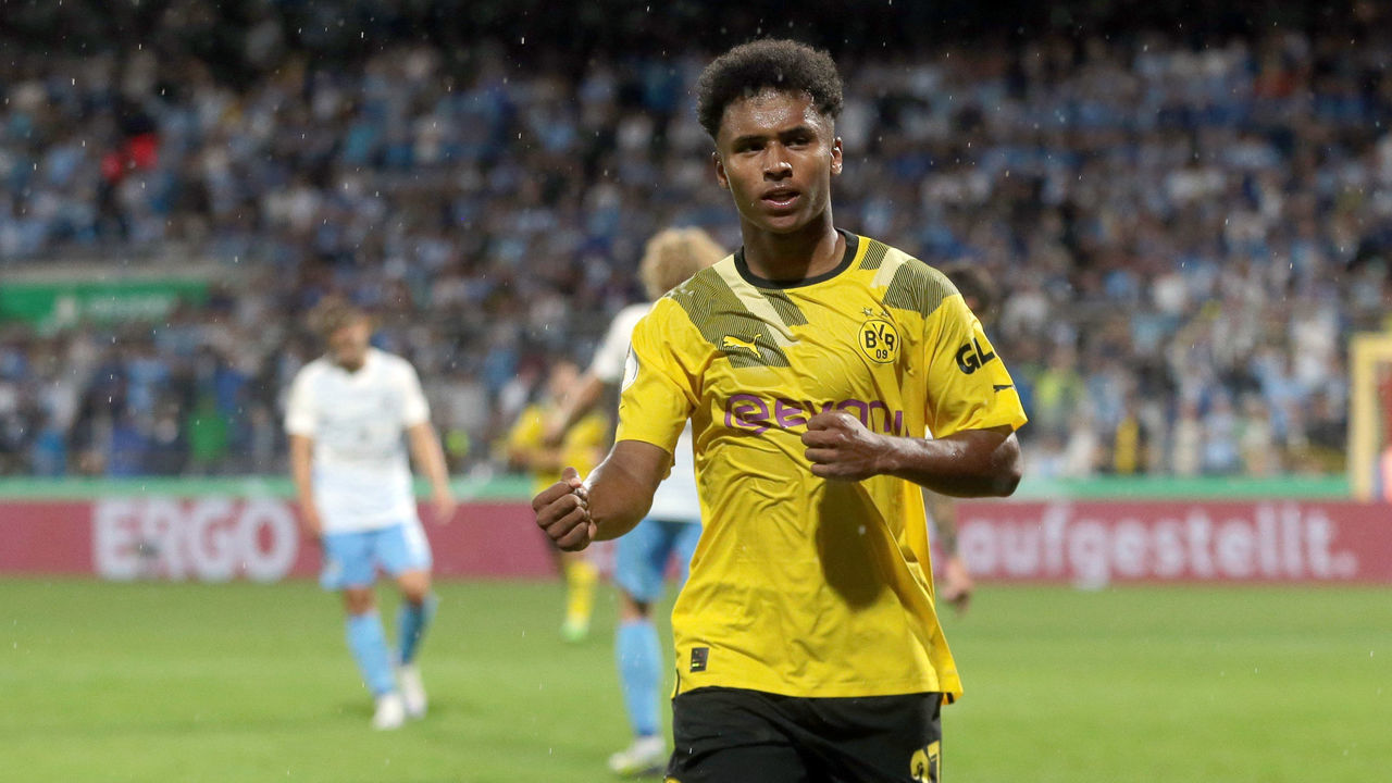 MUNICH, GERMANY - JULY 29: Karim Adeyemi of Borussia Dortmund celebrates after scoring his team's third goal during the DFB Cup first round match between TSV 1860 München and Borussia Dortmund at Stadion an der Gruenwalder Straße on July 29, 2022 in Munich, Germany.