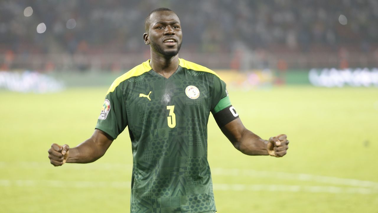 YAOUNDE, CAMEROON - FEBRUARY 06: Kalidou Koulibaly of Senegal celebrates after his team won the Africa Cup of Nations (CAN) 2021 final match against Egypt at Stade d'Olembe in Yaounde, Cameroon on February 06, 2022. Senegal won their first Africa Cup of Nations (AFCON) title Sunday after beating Egypt 4-2 on penalties in the final.