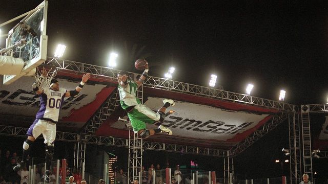 UNITED STATES - MAY 09: SlamBall: Rumble's Dion Mays (44) in action vs Bandits J,D, Green (00), Los Angeles, CA 5/9/2003