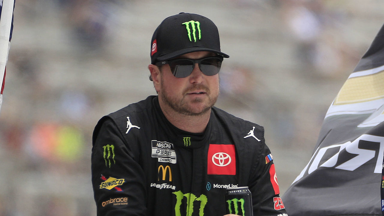 ATLANTA, GA - JULY 10: Kurt Busch (#45 23XI Racing Monster Energy Toyota) and Aric Almirola (#10 Stewart Haas Racing Ford Pro Ford) before the 53rd Annual Quaker State 400 NASCAR race on July 10, 2022 at the Atlanta Motor Speedway in Hampton, Georgia.