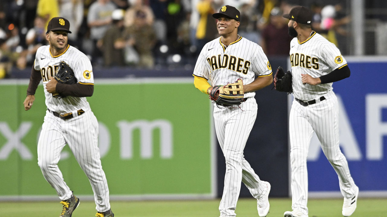 SAN DIEGO, CA - AUGUST 3: (L-R) Trent Grisham #2, Juan Soto #22 and Nomar Mazara #16 celebrate a 9-1 win over Colorado Rockies on August 3, 2022 at Petco Park in San Diego, California.