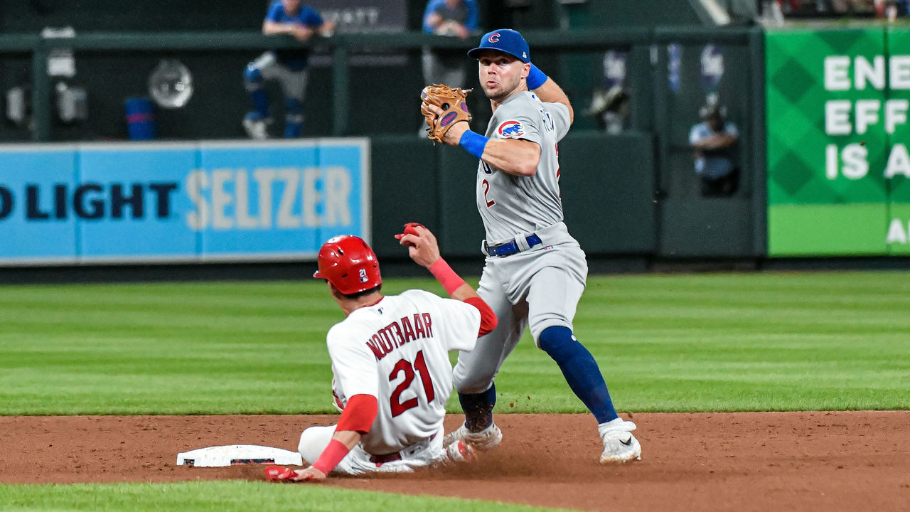 ST. LOUIS, MO - AUG 02: After recording the out on St. Louis Cardinals right fielder Lars Nootbaar (21), Chicago Cubs shortstop Nico Hoerner (2) throws to first to complete a double play during a game between the Chicago Cubs and the St. Louis Cardinals on Aug 02, 2022, at Busch Stadium in St. Louis MO