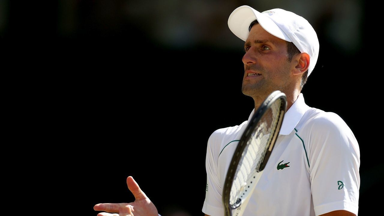 Novak Djokovic of Serbia reacts during the men's singles semifinal match against Cameron Norrie of Great Britain at Wimbledon Tennis Championship in London, Britain, on July 8, 2022.