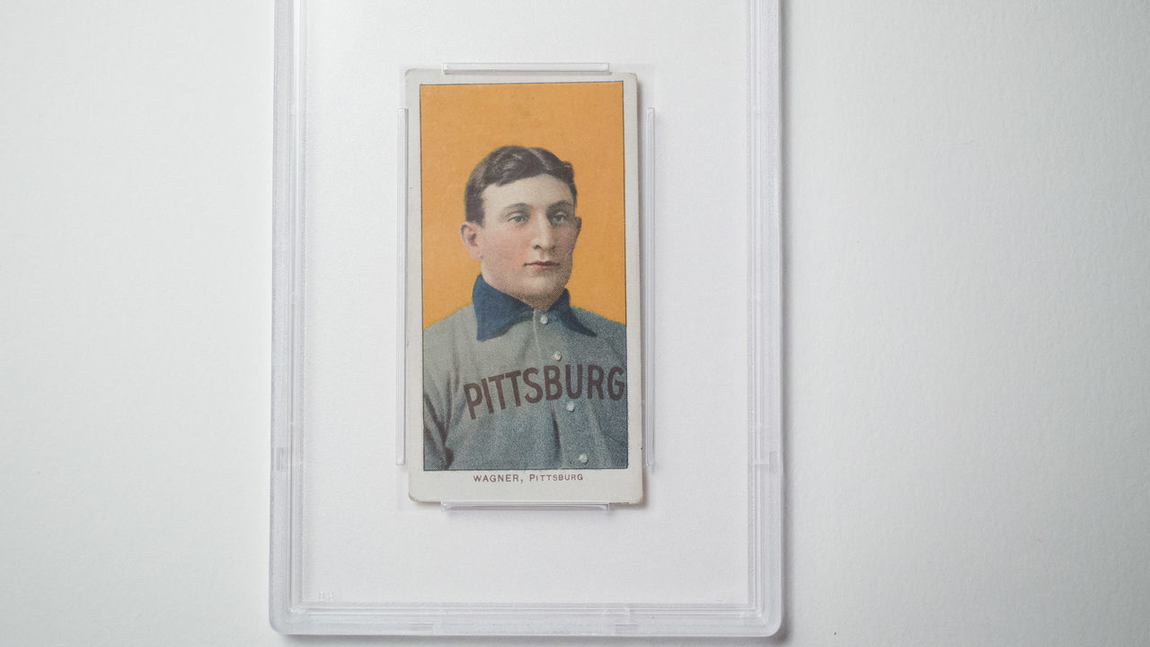 The 1909 baseball card of Pittsburgh Pirates shortstop Honus Wagner is displayed for a photograph in New York, U.S., on Tuesday, Feb. 19, 2013. The trading card that the National Baseball Hall of Fame calls the sport's "most famous collectible" will be up for sale starting Feb. 25, and might fetch more than $2.8 million, according to the auction house. Photographer: Scott Eells/Bloomberg via Getty Images