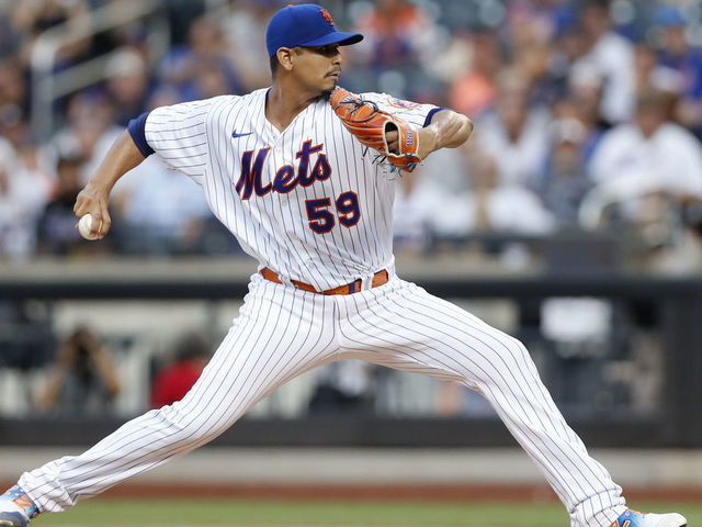 Carlos Carrasco of the New York Mets throws a pitch during the first  News Photo - Getty Images