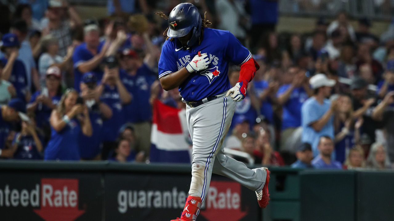 MINNEAPOLIS, MN - AUGUST 04: Vladimir Guerrero Jr. #27 of the Toronto Blue Jays celebrates his three-run home run as he rounds the bases against the Minnesota Twins in the eighth inning of the game at Target Field on August 4, 2022 in Minneapolis, Minnesota. The Blue Jays defeated the Twins 9-3.