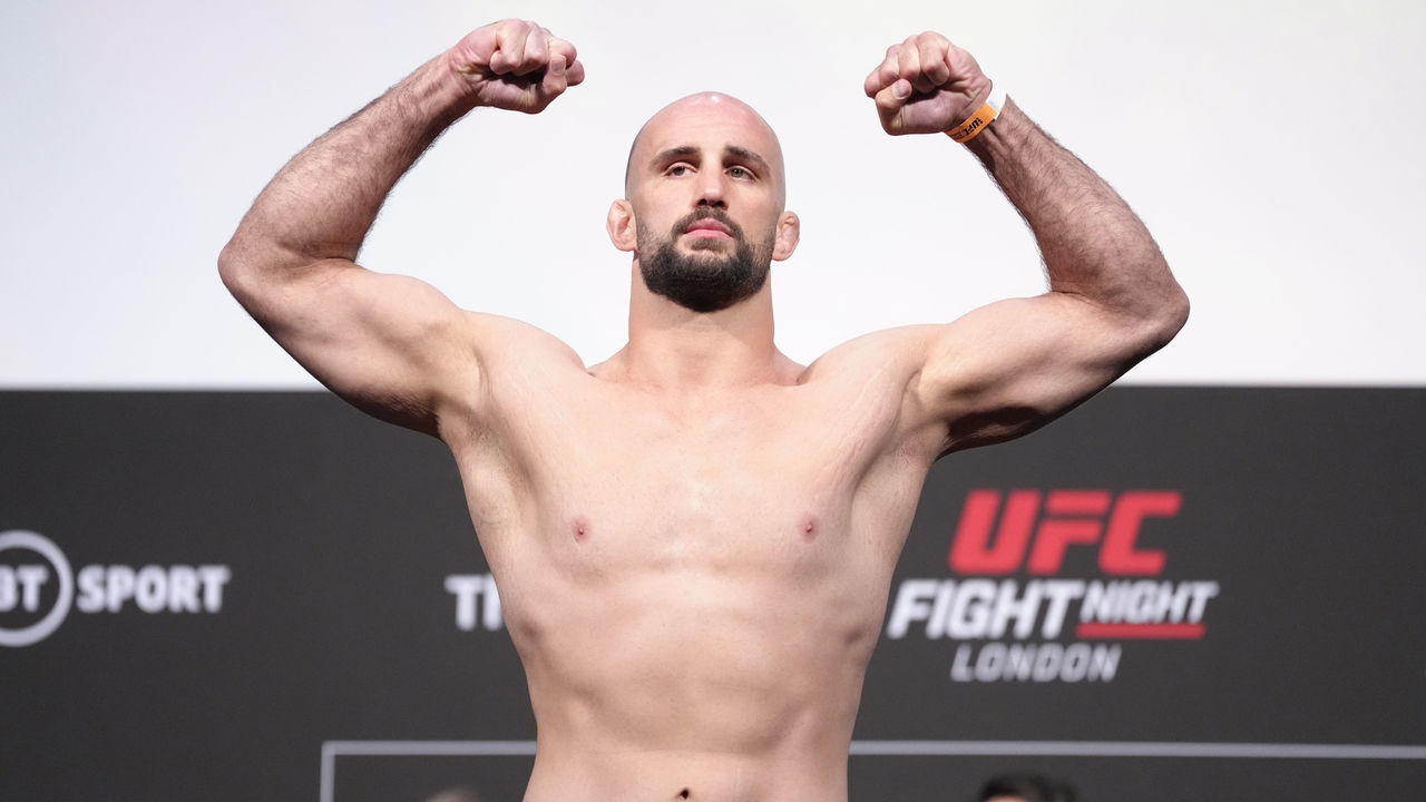 LONDON, ENGLAND - JULY 22: Volkan Oezdemir of Switzerland poses on the scale during the UFC Fight Night ceremonial weigh-in at O2 Arena on July 22, 2022 in London, England.