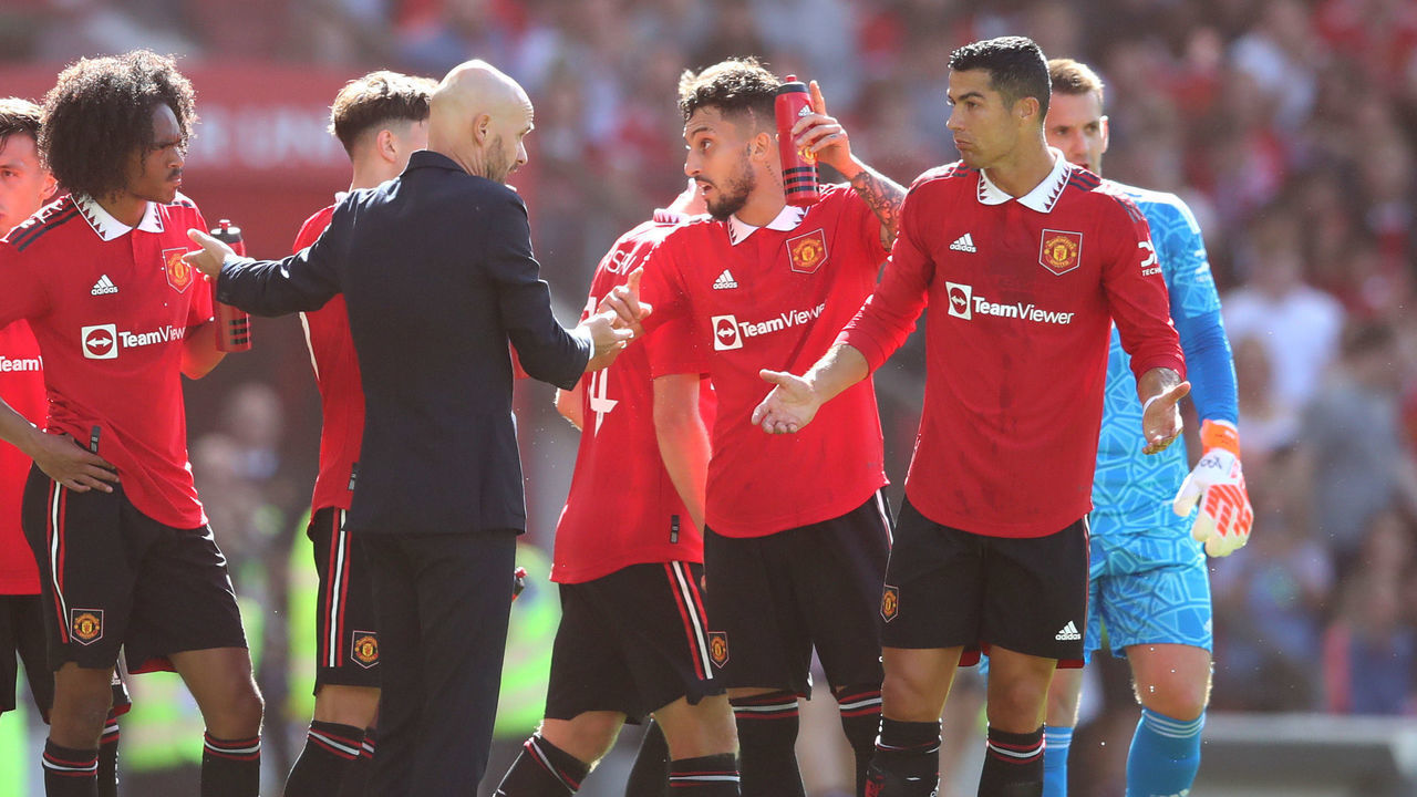 MANCHESTER, ENGLAND - JULY 31: Manchester United manager Erik ten Hag chats with Christiano Ronaldo of Manchester United during the Pre-Season Friendly match between Manchester United and Rayo Vallecano at Old Trafford on July 31, 2022 in Manchester, England.