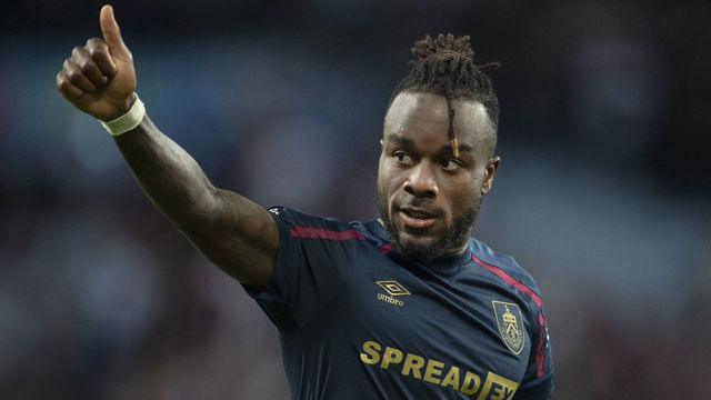 BIRMINGHAM, ENGLAND - MAY 19: Maxwel Cornet of Burnley waves to fans following the Premier League match between Aston Villa and Burnley at Villa Park on May 19, 2022 in Birmingham, England.