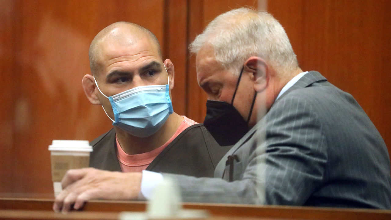 SAN JOSE, CA - MARCH 07: SAN JOSE, CA - MARCH 7: Cain Velasquez, left, is photographed with his attorney Mark Geragos, right, during a hearing at the Santa Clara County Hall of Justice on Monday, March 7, 2022, in San Jose, Calif. Velasquez allegedly shot at a car carrying a man charged with molesting his minor relative, and wounded the accused man's stepfather in South San Jose.