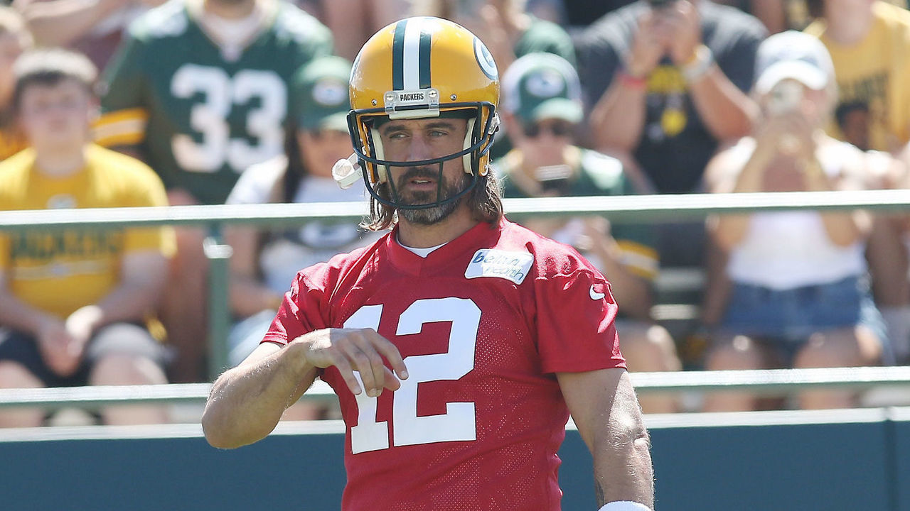 ASHWAUBENON, WI - JULY 30: Green Bay Packers quarterback Aaron Rodgers (12) throws a pass during Green Bay Packers training camp at Ray Nitschke Field on July 30, 2022 in Ashwaubenon, WI