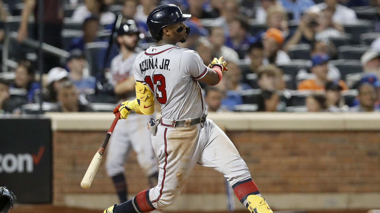 NEW YORK, NEW YORK - AUGUST 05: Ronald Acuna Jr. #13 of the Atlanta Braves hits a single in the third inning against the New York Mets at Citi Field on August 05, 2022 in New York City.
