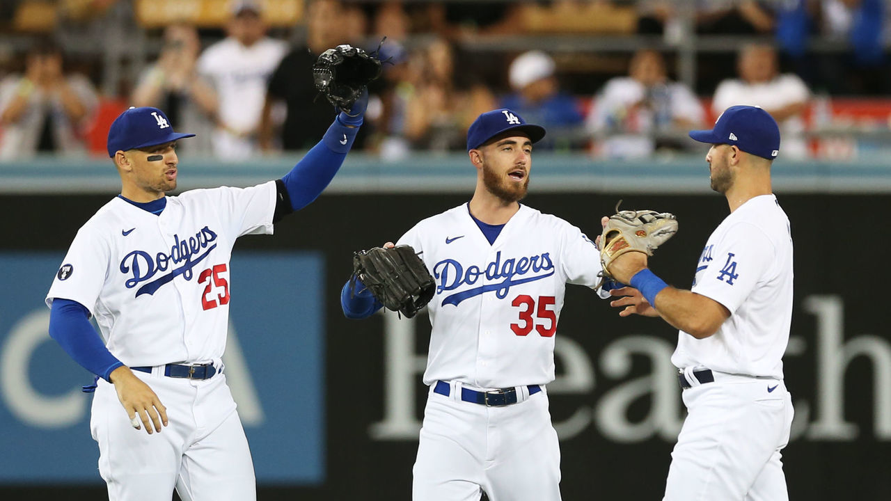LOS ANGELES, CA - AUGUST 05: Trayce Thompson #25, Cody Bellinger #35 and Joey Gallo #12 of the Los Angeles Dodgers celebrate their win over the San Diego Padres at Dodgers Stadium on Friday, August 5, 2022 in Los Angeles, California.
