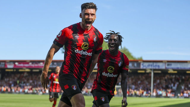 BOURNEMOUTH, ENGLAND - AUGUST 06: Kieffer Moore of Bournemouth celebrates after he heads in and scores a goal to make it 2-0 as Jordan Zemura joins in with the celebration during the Premier League match between AFC Bournemouth and Aston Villa at Vitality Stadium on August 06, 2022 in Bournemouth, England.