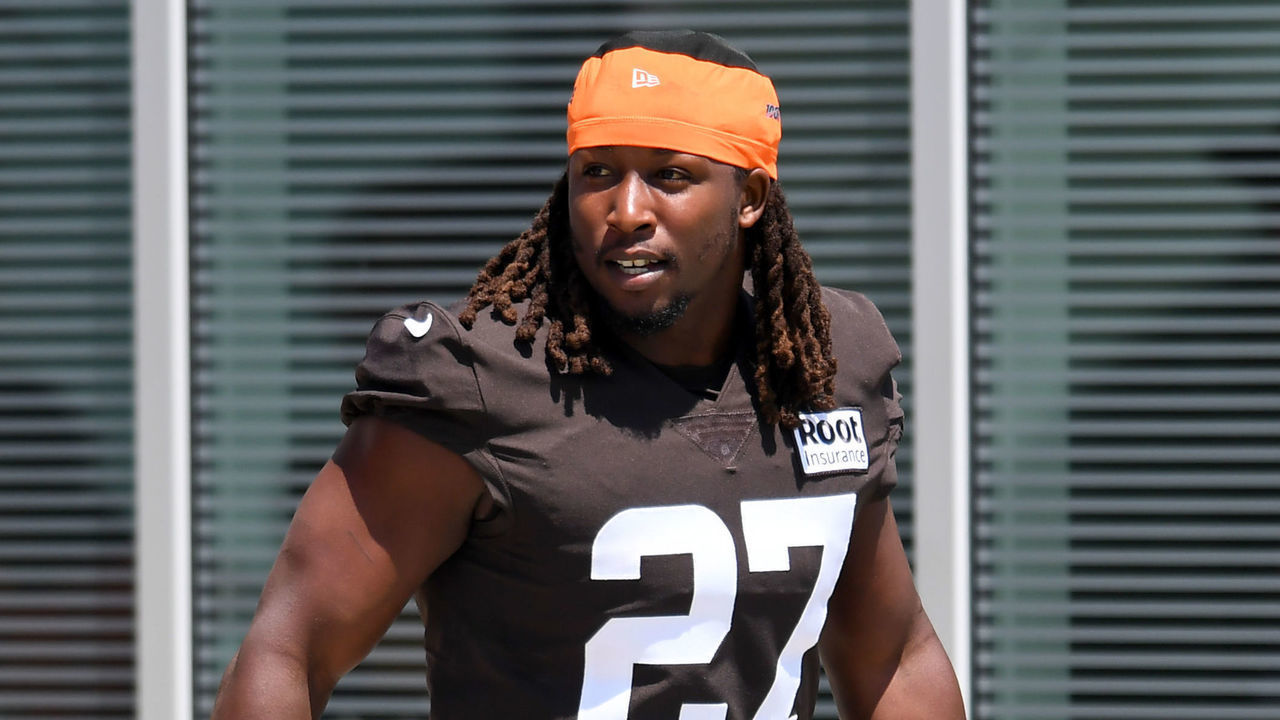BEREA, OH - JULY 30: Kareem Hunt #27 of the Cleveland Browns walks onto the field during Cleveland Browns training camp at CrossCountry Mortgage Campus on July 30, 2022 in Berea, Ohio.