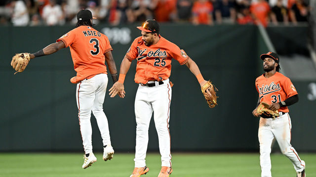 BALTIMORE, MARYLAND - AUGUST 06: Jorge Mateo #3 and Anthony Santander #25 of the Baltimore Orioles celebrate after a 6-3 victory against the Pittsburgh Pirates at Oriole Park at Camden Yards on August 06, 2022 in Baltimore, Maryland.