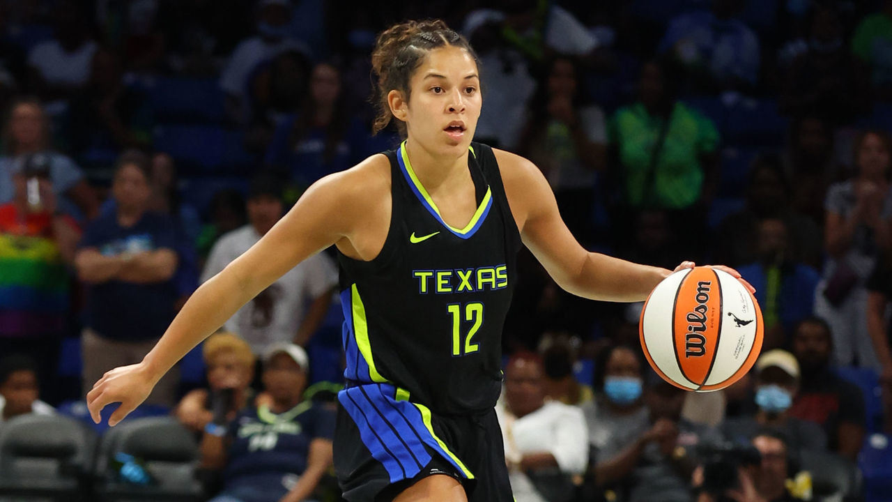 ARLINGTON, TX - AUGUST 6: Veronica Burton #12 of the Dallas Wings handles the ball during the game against the Indiana Fever on August 6, 2022 at the College Park Center in Arlington, Texas. NOTE TO USER: User expressly acknowledges and agrees that, by downloading and/or using this Photograph, user is consenting to the terms and conditions of the Getty Images License Agreement. Mandatory Copyright Notice: Copyright 2022 NBAE