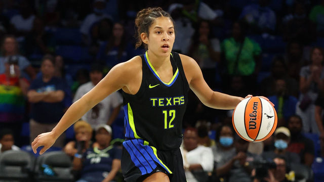 ARLINGTON, TX - AUGUST 6: Veronica Burton #12 of the Dallas Wings handles the ball during the game against the Indiana Fever on August 6, 2022 at the College Park Center in Arlington, Texas. NOTE TO USER: User expressly acknowledges and agrees that, by downloading and/or using this Photograph, user is consenting to the terms and conditions of the Getty Images License Agreement. Mandatory Copyright Notice: Copyright 2022 NBAE