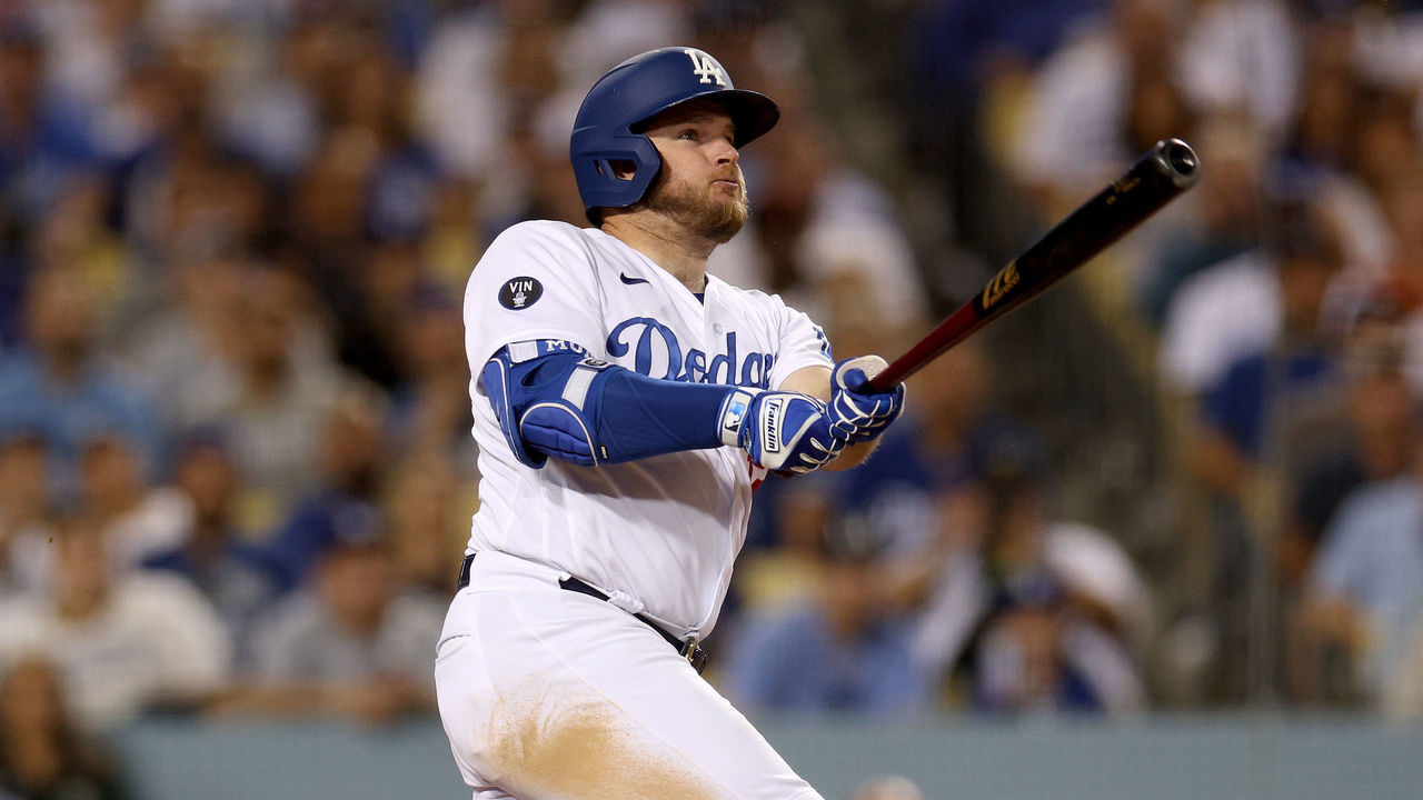 LOS ANGELES, CALIFORNIA - AUGUST 06: Max Muncy #13 of the Los Angeles Dodgers watches his three run homerun, to take a 5-3 lead, during the fifth inning at Dodger Stadium on August 06, 2022 in Los Angeles, California.