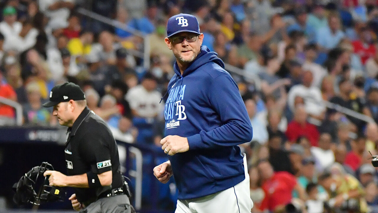 ST PETERSBURG, FLORIDA - OCTOBER 07: Kyle Snyder #44 of the Tampa Bay Rays returns to the dugout after visiting the mound in the fifth inning against the Boston Red Sox during Game 1 of the American League Division Series at Tropicana Field on October 07, 2021 in St Petersburg, Florida.