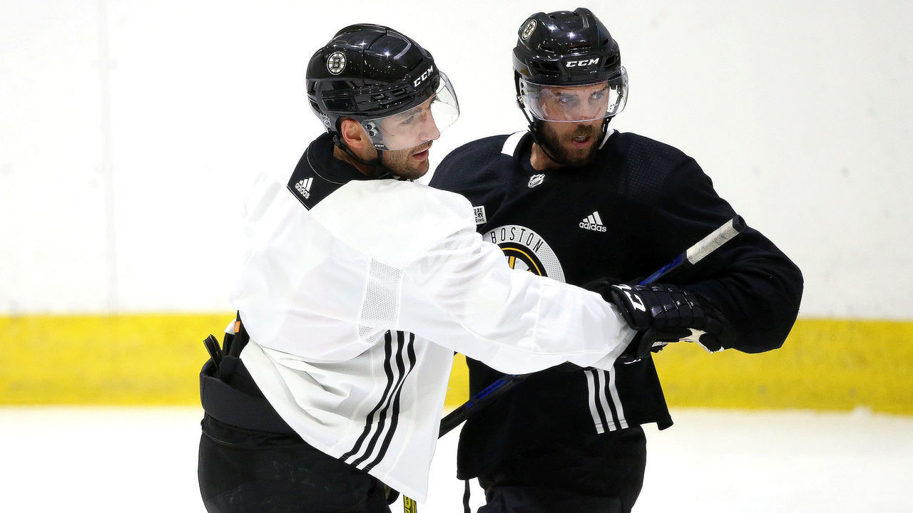 BOSTON - JULY 21: Boston Bruins center Patrice Bergeron (37) and Boston Bruins center David Krejci (46) during Boston Bruins summer training camp at Warrior Ice Arena in Boston on July 21, 2020.
