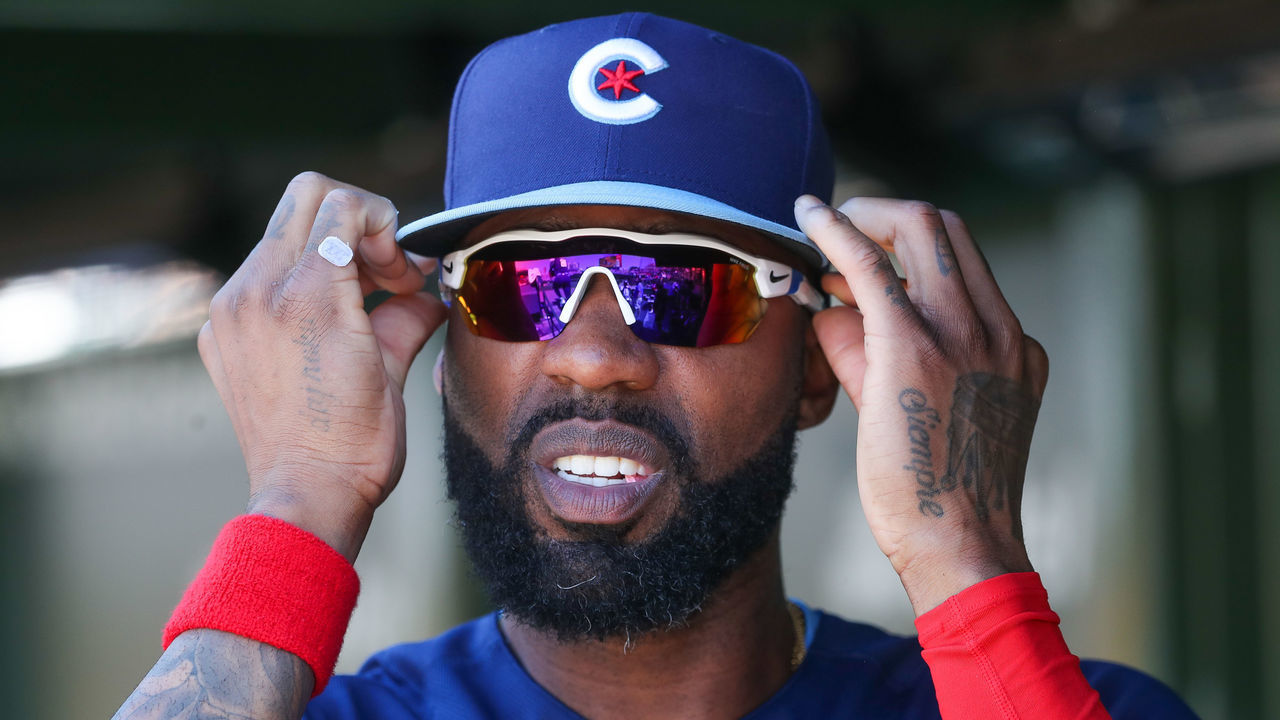 CHICAGO, ILLINOIS - JUNE 17: Jason Heyward #22 of the Chicago Cubs adjusts his sunglasses during the 7th inning at Wrigley Field on June 17, 2022 in Chicago, Illinois.